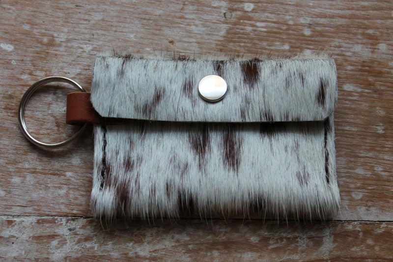 Red and White Speckled Cowhide Fluffy Pouch