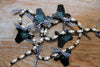 Mini Black Heifer Head Garland with Teal Flowers