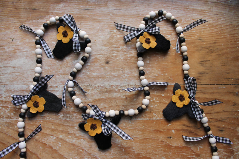 Mini Black Heifer Head Garland with Sunflowers
